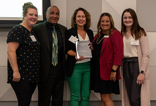 Photo of Bellevue Family Practice receiving the 2023 Most Engaged Clinic Award from Nebraska Health Network